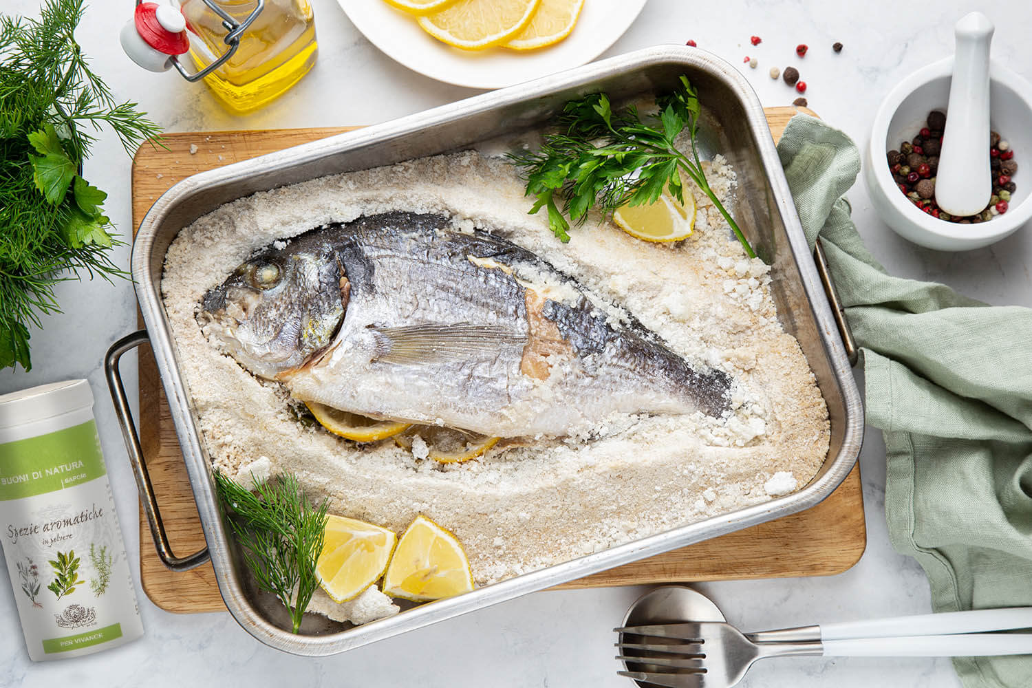 delicious  salt-baked dorada fish with lemon and herbs